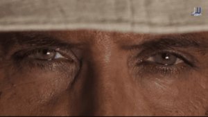 Alpha movie 2026 Hrithik Roshan cameo Agent Kabir - extreme close-up of intense eyes beneath a hat in the Alpha trailer